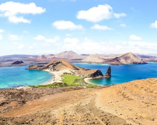 Panoramic view of " Isla Bartolome " at Galapagos Islands archipelago - Travel and wanderlust concept exploring world nature wonders around Ecuador - Vivid filter with warm bright color tones